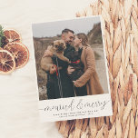 Married & Merry Simple Christmas Holiday Photo Card<br><div class="desc">Warm wishes from the new Mr. & Mrs.! This design is perfect for any newlywed couple! The top of the card is decorated with a big photo of your choice. Below that, it reads "married & merry" in elegant script font, with flourishes on either end, reaching the edge of the...</div>