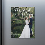 Married Merry Wedding Photo Christmas Card Magnet<br><div class="desc">Gorgeous white calligraphy reading Married and Merry over your full wedding photograph for a beautiful newlywed holiday card magnet. This just married couple Christmas magnetic card features elegant white cursive script at the top.</div>
