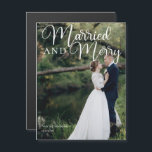 Married Merry Wedding Photo Christmas Card Magnet<br><div class="desc">Gorgeous white calligraphy reading Married and Merry over your full wedding photograph for a beautiful newlywed holiday card magnet. This just married couple Christmas magnetic card features elegant white cursive script at the top.</div>
