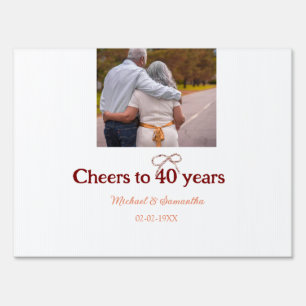 Marron bow cheers to 40 years anniversary wedding sign