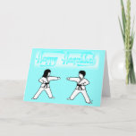 Martial Arts Hanukkah Greeting Cards<br><div class="desc">Martial Arts greeting cards for the Hanukkah holiday season feature a boy and girl Martial Artist on the front with a blue background and a banner saying Happy Hanukkah. Inside says As you celebrate the Festival of Lights, may your home be filled with happiness. Or you may order these cards...</div>