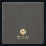 Masculine Black and Gold Personalized Groomsmen Stone Coaster<br><div class="desc">Add a personal touch to your wedding with personalized groomsmen stone coaster. This coaster features black monogram in gold circle element with name and title in gold professional font style on black background. Also perfect for best man, father of the bride, ring bearer and more. Please Note : The foil...</div>
