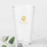 Masculine Gold Personalized Groomsmen Glass<br><div class="desc">Add a personal touch to your wedding with personalized groomsmen glass. This glass features monogram in gold circle element with name and title in gold professional font style. Also perfect for best man, father of the bride, ring bearer and more. Please Note : The foil details are simulated in the...</div>