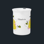 Meant to Bee Beehive Pitcher<br><div class="desc">A cute design featuring busy bees buzzing around their beehives. Little pink flowers accent them. The message and can be changed as desired.</div>