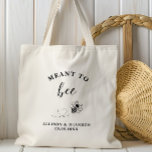 Meant to Bee Favor Wedding Welcome Tote Bag<br><div class="desc">Celebrate your special day with this charming Meant to Bee wedding tote bag! Featuring elegant script and a sweet bee-inspired design, it’s the perfect favor for guests or a thoughtful gift for your bridal party. Ideal for rustic, garden, or boho-themed weddings, this reusable bag adds a touch of charm and...</div>