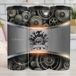 Mechanic Tools Emblem Gear Background Thermal Tumbler<br><div class="desc">This graphic features a central, black and white emblem depicting a hand firmly grasping a wrench, surrounded by an assortment of other tools like a hammer, screwdriver, and paintbrushes, with a blank banner below. This emblem is positioned over a sleek, metallic silver band that spans the middle of the image....</div>