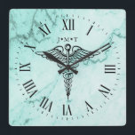 Medical Caduceus Symbol Custom Initials Marble Square Wall Clock<br><div class="desc">An elegant medical caduceus themed wall clock.  It features a marble backdrop with your custom initials in the foreground.   Surrounding the outer edges are stark yet classy Roman numerals.</div>