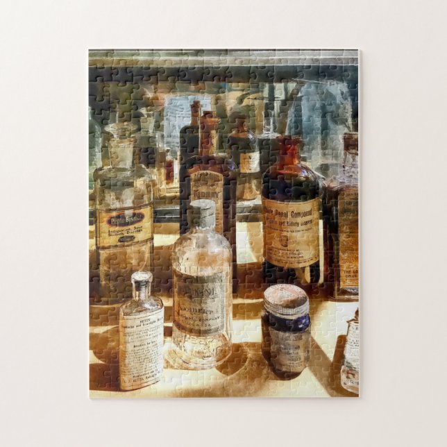 Medicine Bottles in Glass Case Jigsaw Puzzle (Vertical)