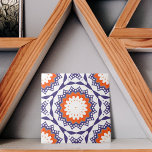 Mediterranean Azulejo Blue White and Orange Mosaic Ceramic Tile<br><div class="desc">At the heart of this ceramic tile's design is a radiant starburst pattern in a vibrant shade of orange, which seems to emanate energy and warmth. This central motif is surrounded by a series of geometric shapes in deep blue and white, creating a stark contrast that adds depth to the...</div>