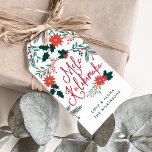Mele Kalikimaka | Hawaiian Christmas Gift Tags<br><div class="desc">Tropical chic gift tags feature the Hawaiian Christmas greeting "Mele Kalikimaka" surrounded by festive holiday greenery,  red poinsettia flowers and holly. Add your name(s) and/or a custom greeting along the bottom. Blank on reverse side for recipient names.</div>