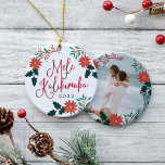 Mele Kalikimaka | Hawaiian Christmas Photo Ceramic Ornament<br><div class="desc">Festive holiday ornament features the Hawaiian Christmas greeting "Mele Kalikimaka" in red hand lettered typography,  surrounded by red poinsettias,  holly leaves and Christmas greenery. Customize with the year,  and add a favorite photo or vacation snapshot to the reverse side,  adorned with matching holiday florals.</div>