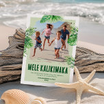 Mele Kalikimaka Hawaiian Photo Christmas Holiday Card<br><div class="desc">Immerse yourself in the festive spirit, with a tropical twist! Our 'Tropical Christmas Holiday Cards' are the perfect blend of tradition and uniqueness featuring a rustic family photo template against a vibrant green backdrop. Enhanced with lush watercolor palm leaves and the Hawaiian greeting 'Mele Kalikimaka', it's a personal touch for...</div>