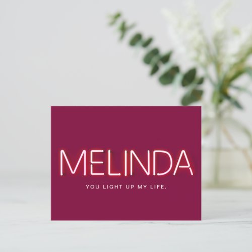 Melinda name in glowing neon lights postcard