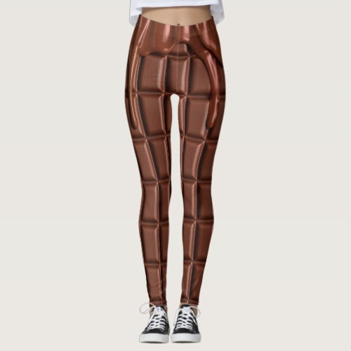 Melted chocolate dripping over a chocolate block leggings