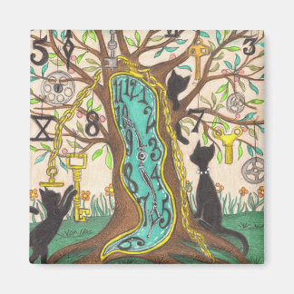 Melting clock in tree with cats magnet