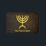 Menorah Flame Bath Mat<br><div class="desc">A brown and gold digital rendering of the Jewish seven-branched menorah (Hebrew: מְנוֹרָה‎). Add your own text. The seven-branched menorah, used in the portable sanctuary set up by Moses in the wilderness and later in the Temple in Jerusalem, has been a symbol of Judaism since ancient times and is the...</div>