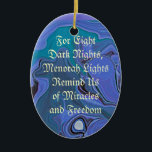 menorah lights blue ornament<br><div class="desc">Blue swirls of night color flow in the background. A text message: "For eight dark nights,  menorah lights remind us of miracles and freedom." on one side. On the other a silver and blue menorah.</div>