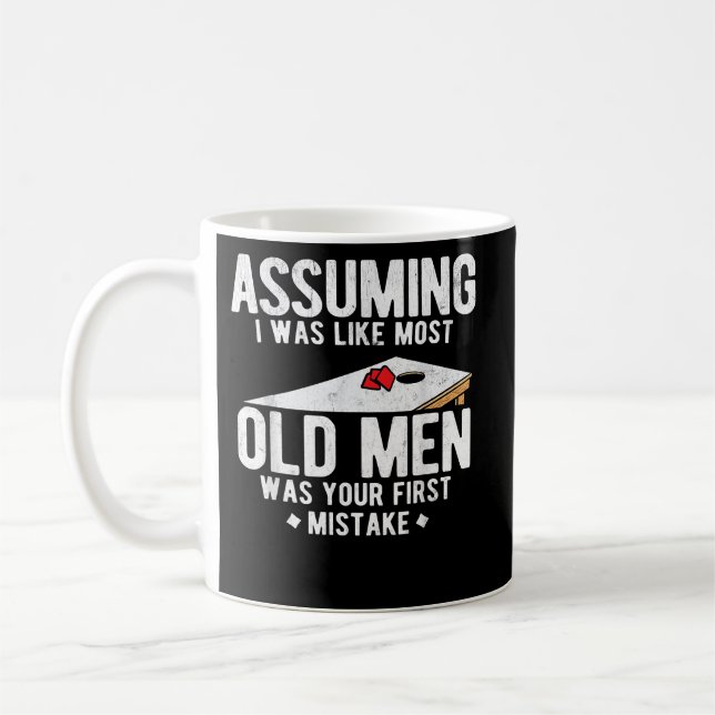 Mens AssumingI Was Like Most Old Men Cornhole Coffee Mug (Left)