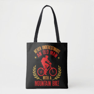Mens Never Underestimate An Old Man With A Mountai Tote Bag