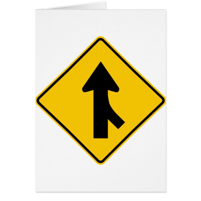 a merging traffic sign warns you