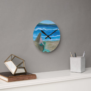 Mermaid contemplating the waves round clock