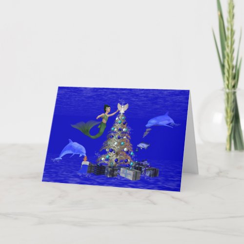Mermaid decorating the christmas tree holiday card