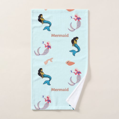 Mermaid pattern on blue hand towel 