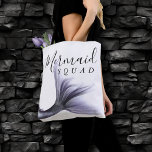 Mermaid Squad | Lavender Purple Chic Bachelorette Tote Bag<br><div class="desc">Sophisticated and minimal "Mermaid Crew/Squad" bachelorette or bridal party custom keepsake favor to show appreciation for your best friends and family that stood by you. This feminine "Under the Sea" theme features an elegant whimsical faux mixed metal glitter mermaid scale pattern and tail with a metallic iridescent sheen. For other...</div>