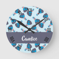 Mermaids sitting on rocks pattern round clock