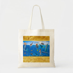 Mermaids with dolphins tote bag