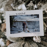merrily married Minimalist Wedding Photo Holiday Card<br><div class="desc">Simple and elegant wedding announcement card for the holiday season featuring a message above your photo that says "merrily married" with a heart. You can add a 2nd picture on the back of the card along with your message. Perfect Christmas wedding announcement card!</div>