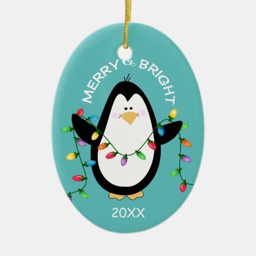 Merry and Bright Christmas Penguin Fun Blue Oval Ceramic Ornament