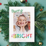 Merry and Bright Tissue Paper Christmas Photo Holiday Card<br><div class="desc">This fun, bright Christmas holiday card features colorful text, reading, "Merry & Bright" in green, lime, cherry red, pink, golden yellow, and aqua. The typography for the word "Bright" incorporates an overlapping tissue paper design, which is also included on the back (overlapping Christmas trees). The tissue paper has a crafty,...</div>