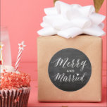 Merry And Married Black Chalkboard Holiday Wedding Classic Round Sticker<br><div class="desc">Designed by fat*fa*tin. Easy to customize with your own text,  photo or image. For custom requests,  please contact fat*fa*tin directly. Custom charges apply.

www.zazzle.com/fat_fa_tin
www.zazzle.com/color_therapy
www.zazzle.com/fatfatin_blue_knot
www.zazzle.com/fatfatin_red_knot
www.zazzle.com/fatfatin_mini_me
www.zazzle.com/fatfatin_box
www.zazzle.com/fatfatin_design
www.zazzle.com/fatfatin_ink</div>