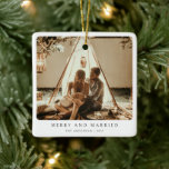 Merry and Married Minimalist Couple Photo Ceramic Ornament<br><div class="desc">Celebrate your first holiday season together with our Merry and Married Minimalist Couple Photo Ceramic Ornament. This elegant ornament features a clean, minimalist design with "Merry and Married" typography, paired with a personalized photo of the happy couple. Crafted from durable ceramic, it’s the perfect keepsake to commemorate your special year....</div>