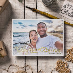 Merry Beachy Christmas fun vacation photo Foil Holiday Card<br><div class="desc">Share your favorite beach vacation picture with this fun and modern beach Christmas photo card featuring a trendy hand-lettered typography overlay that reads "Merry Beachy Christmas" decorated with waves, sun, and surfboard illustrations. Easily personalizable with one of your favorite holiday pictures and your names. The back of the card features...</div>
