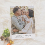 Merry & Bright Minimalist Christmas Holiday Photo Card<br><div class="desc">Create a lasting impression this season with a unique holiday card! These modern minimalist Christmas holiday cards feature a photo of your choice at the top of the card with a simple typography message at the bottom. The typography reads "merry bright" with a custom greeting below alongside the year. Cards...</div>