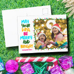 Merry Bright Pink Blue Christmas Lights Photo Holiday Postcard<br><div class="desc">Cute and cheerful family photo holiday postcards featuring a colorful strand of Christmas lights wrapped around your kids photograph. May Your Days Be Merry and Bright written in bold letters from light blue to your family name in hot pink. A rainbow of colors for the holidays.</div>