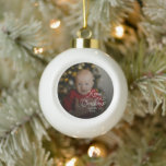 Merry Christmas Baby Photo Ceramic Ball Christmas Ornament<br><div class="desc">Celebrate your little one’s special milestone with the Baby’s First Christmas Photo Ceramic Ornament. Featuring your baby’s adorable photo and personalized text, this keepsake adds a heartfelt touch to your holiday tree. Perfect for parents, grandparents, or godparents, it captures the joy and wonder of your baby’s first festive season. A...</div>