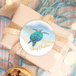 Merry Christmas Beach Coastal Sea Turtle Classic Round Sticker<br><div class="desc">Perfect for envelope seals, favors, and gifts, these coastal Christmas stickers feature a watercolor turquoise blue sea turtle on an abstract beach background with a faux gold glitter sparkly wave, and gold Merry Christmas. Check out the collection for more matching products, or contact me through Zazzle Chat if you need...</div>