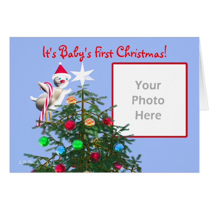 cute baby christmas bird on a christmas tree wearing a red hat and
