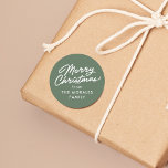 Merry Christmas casual script green holiday gift Classic Round Sticker<br><div class="desc">Add this personalized Merry Christmas sticker to all your Christmas gifts. This sage green Christmas gift sticker features a casual "Merry Christmas" along with custom text. Add a from to your Christmas presents, Christmas party favors and more. Also great as a Christmas cookie sticker or for other food gifts. Find...</div>