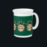 Merry Christmas Cookie with Holly Berries Beverage Pitcher<br><div class="desc">This festive design features a delicious-looking Christmas cookie adorned with white icing and the handwritten message “Merry Christmas” in elegant script. Crowned with glossy red holly berries and deep green holly leaves, the image captures the cozy charm of holiday baking and traditional yuletide decor. The warm, golden-brown cookie base contrasts...</div>