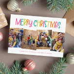 Merry Christmas cute bright fun four photo Holiday Card<br><div class="desc">Merry Christmas! This merry and bright colorful four-photo Christmas card design is the perfect way to send cheer this year. With its playful type, this holiday photo card is perfect for families, but also works well for couple holiday cards, pet holiday cards and more. The back is a coordinating trendy...</div>