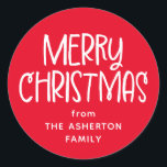 Merry Christmas cute fun red family name Classic Round Sticker<br><div class="desc">This fun festive Christmas sticker features a playful Merry Christmas in white on red and room for your custom text. You can personalize this cute holiday gift sticker with who the gift is from or another message. Find more matching cards, gift wrap and more in a variety of colors and...</div>