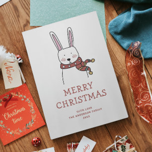 Merry Christmas. Cute funny winter rabbit animal Holiday Card