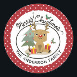 Merry Christmas Cute Reindeer Personalized Name Classic Round Sticker<br><div class="desc">This cute design features a reindeer sitting near a christmas tree with two christmas presents with the words "Merry Christmas" above. Personalize by editing the text in the text box or delete for no text. On the reverse white dot pattern on festive red background. #christmas #holidays #seasonal #festive #merry #merrychristmas...</div>