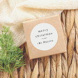 Merry Christmas | Elegant Minimalist Typography Classic Round Sticker<br><div class="desc">Add a festive touch to your holiday gifts and cards with this round “Merry Christmas” sticker. Featuring classic serif typography and a stylish horizontal line divider, the design is personalized with your family name. Perfect for sealing envelopes, decorating presents, or adding a personal touch to any holiday item, these stickers...</div>