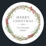 Merry Christmas Family Name Winter Greenery  Classic Round Sticker<br><div class="desc">Merry Christmas sticker with your family name in elegant modern typography and a classic stylish winter greenery wreath with red berries. Simply add your name. Exclusively designed for you by Happy Dolphin Studio. If you need any help or matching products please contact us through our store.</div>