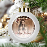 Merry Christmas Family Photo Rose Gold Script Ceramic Ball Christmas Ornament<br><div class="desc">Spread holiday cheer to friends and family with this modern keepsake ornament. The rose gold faux foil text reads "Merry Christmas" in elegant handwriting script. Replace the sample image with your favorite photo,  and add your family name and the year. A white gradient filter helps make the text pop.</div>